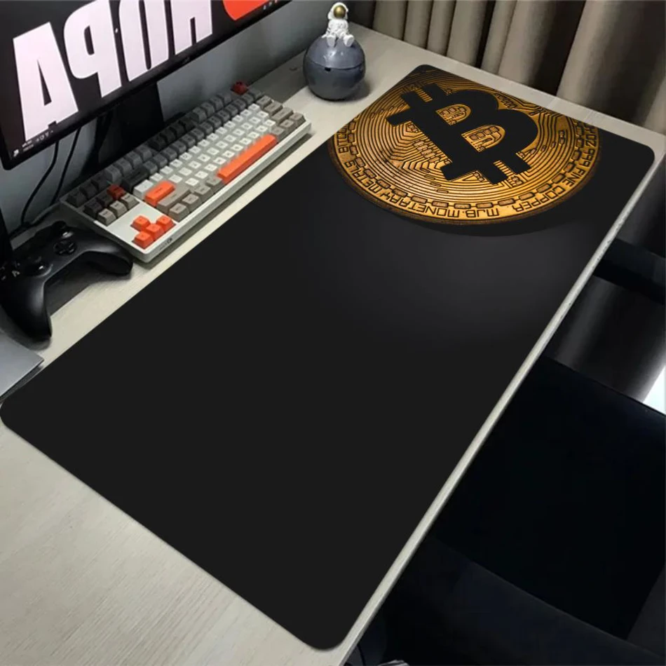 Large Bitcoin Gaming Mouse Pad with Stitched Edges and Anti-Slip Rubber Base. This extra-large, durable computer desk mat provides a smooth surface for precision gaming and work.