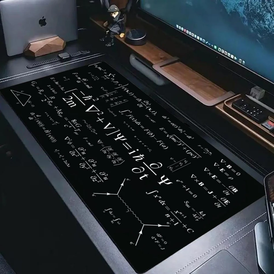 Large Physics Science Formula Gaming Mouse Pad with a non-slip rubber base. This extended desk mat works as a stylish, stable surface for your keyboard and mouse during any gaming
